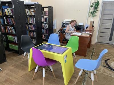 Приміщення бібліотеки та інтерактивний стіл